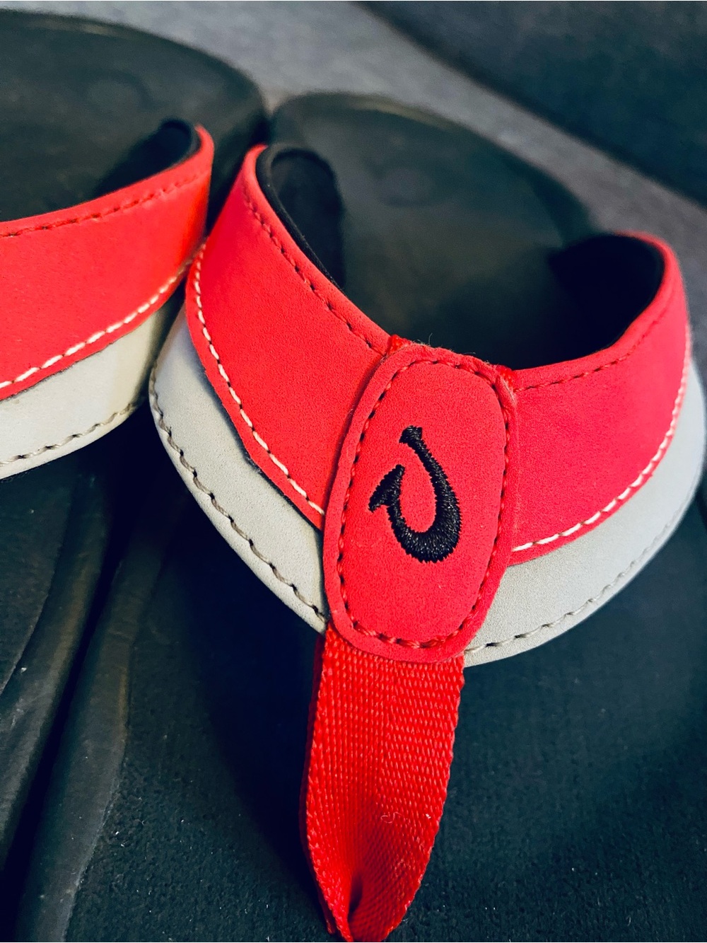 OluKai Flip Flops with Red and Gray Strap